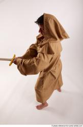 JOEL_ADAMSON STANDING POSE WITH SWORD